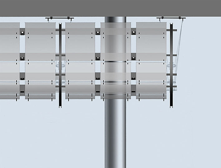 A cable-suspended 68 ft. long assembly of silvery, perforated metal panels with low-voltage lights was proposed for the entry hall of the ADL.  The wing-like metal structure creates a multidimensional effect.  Lighting from the front brings out its sculptural, three-dimensional quality, while lighting of its background creates a two-dimensional, graphic effect for the viewer passing underneath.